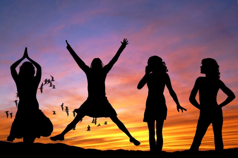 happy, women, silhouette-of-female-friends-relaxing-at-sunset-with-birds-in-background